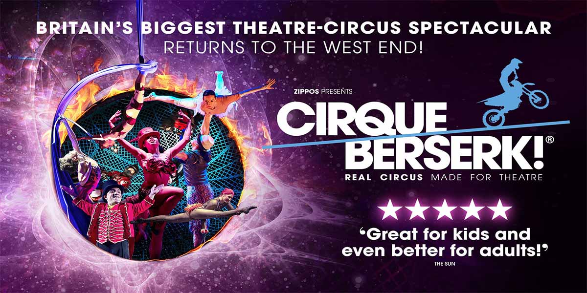 A performer in a red costume balances on a unicycle, surrounded by circus props and vibrant stage lights.