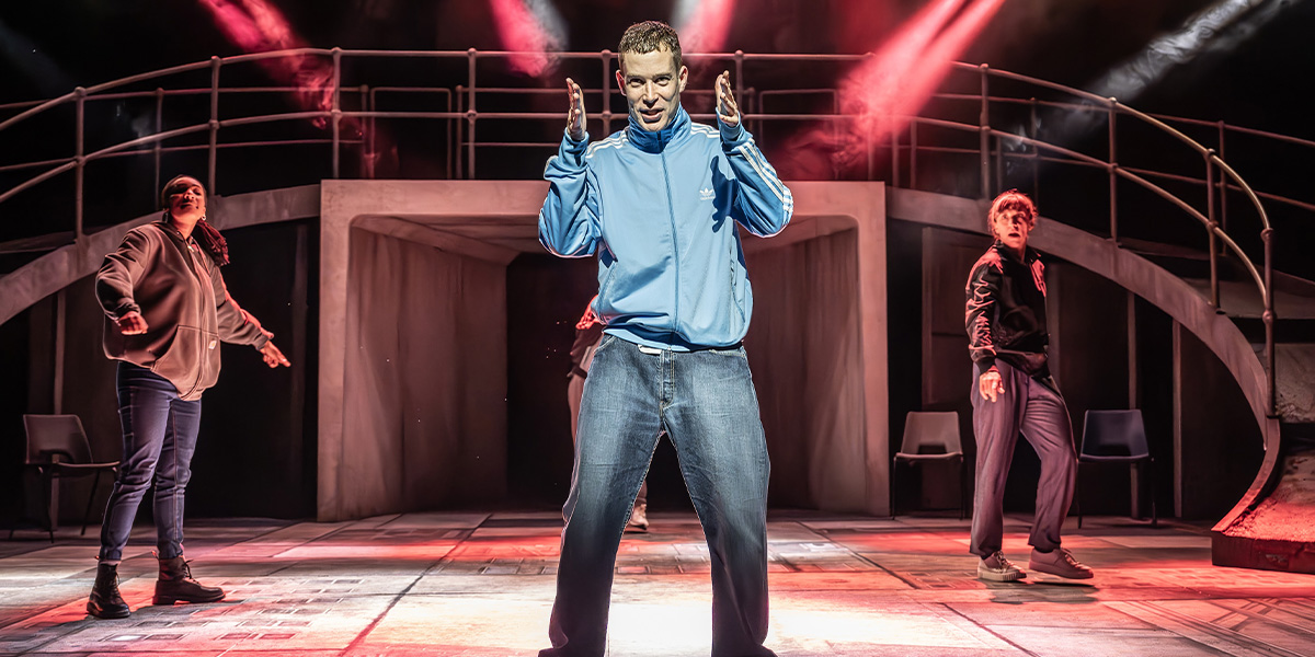 Shalisha James-Davis, David Shields, and Emma Pallant perform on stage, surrounded by dramatic lighting and set design.