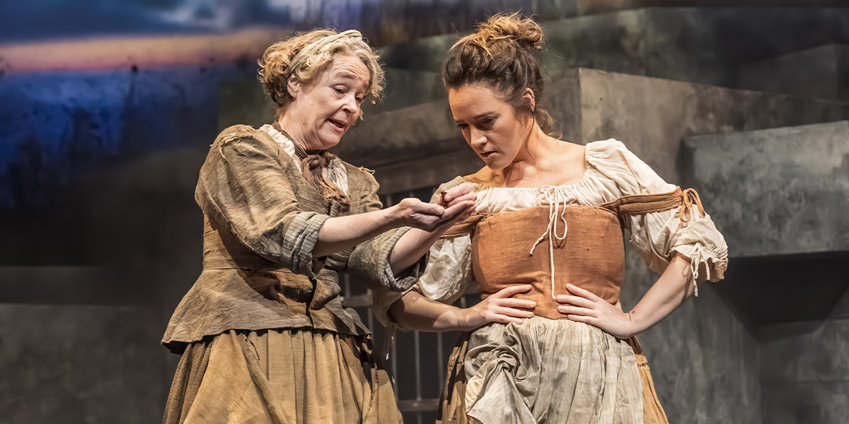 Penny Layden as Martha and Lauryn Redding as Rose perform together on stage at Kiln Theatre.