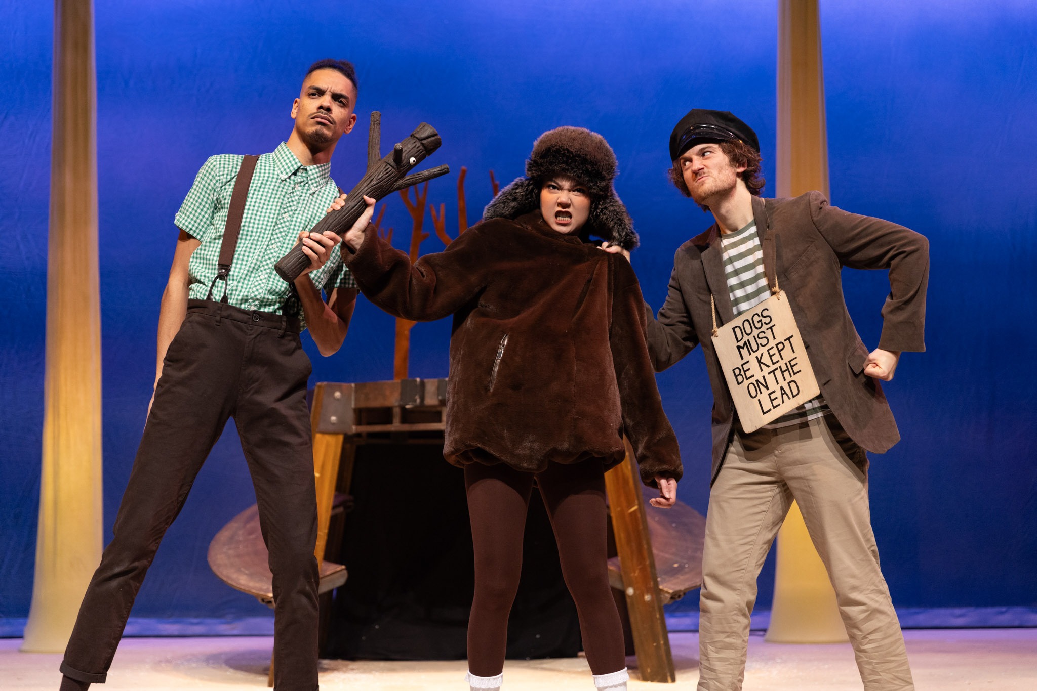 A stick figure stands upright, arms outstretched, against a plain white background.