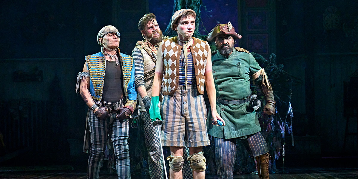 Wendy and Peter Pan are flying together against a starry night sky, surrounded by soft clouds.