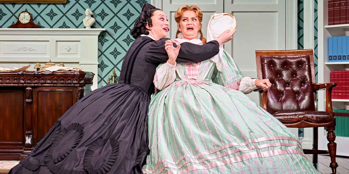 Jinkx Monsoon as Mary Todd Lincoln and Kate O'Donnell as Mary's Chaperone, both in period costumes.