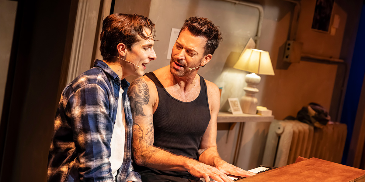 Killian Thomas Lefevre and Levi Kreis pose together, smiling, against a soft-focus background.