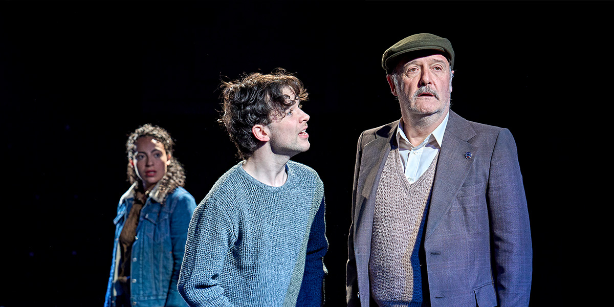 Bella Aubin as Jill Mason, Noah Valentine as Alan Strang, and Colin Mace as Frank Strang in a dramatic scene.