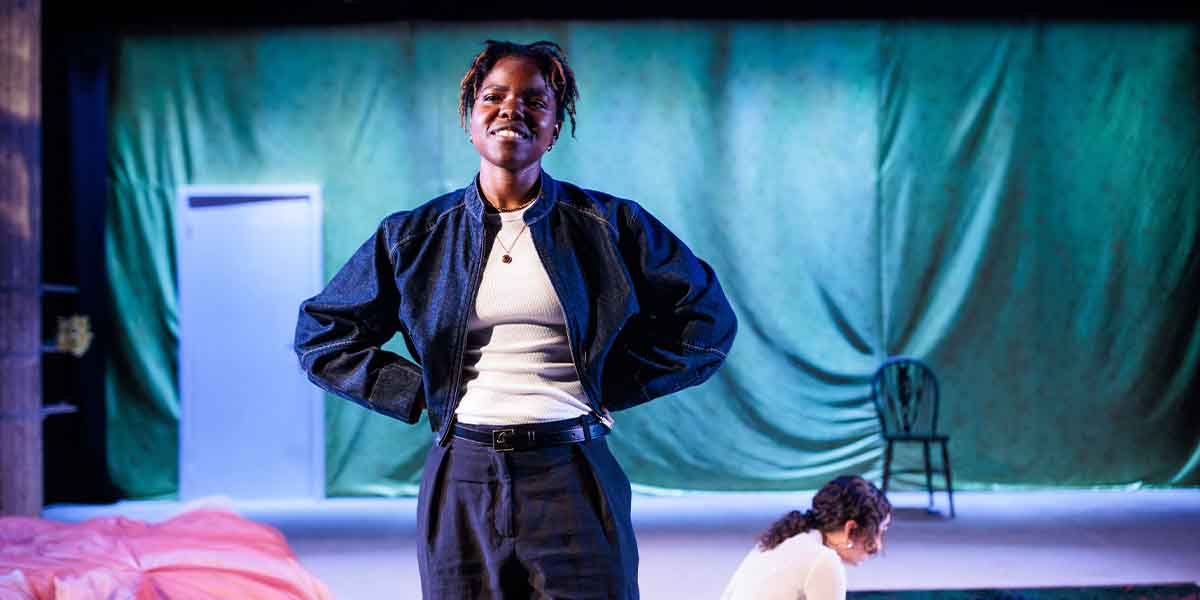 Francesca Amewudah-Rivers smiles confidently in a denim jacket, while Nadi Kemp-Sayfi sits in the background.