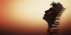 A side profile of a person can be sean against an orange background.