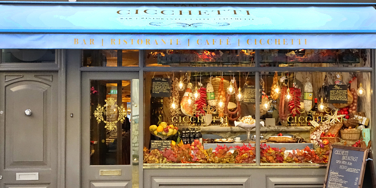 Current image: The exterior of Cicchetti restaurant in Covent Garden, featuring a modern facade and outdoor seating.